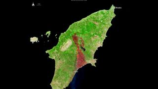 A burn scar across the Greek island of Rhodes seen by Europe's Sentinel 2 satellite from space.