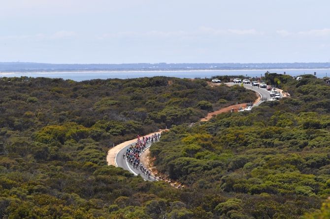 The bunch follows the winding road out of Bells Beach