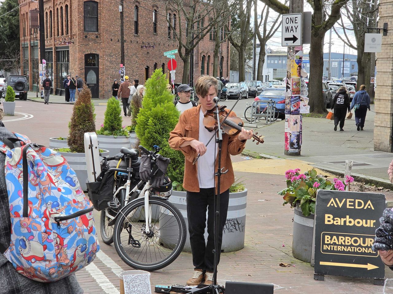 A man playing a violin (3x)