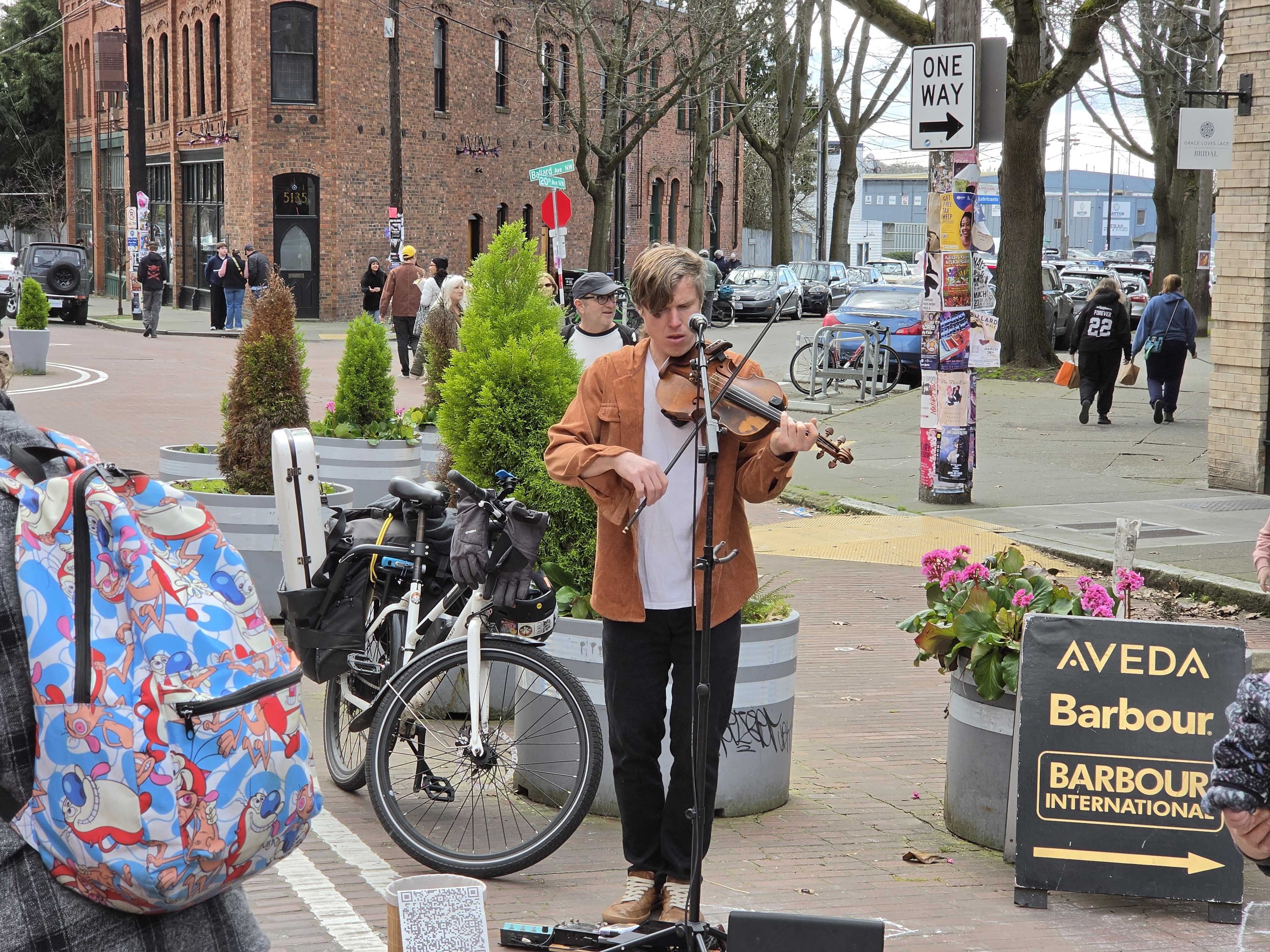 A man playing a violin (3x)