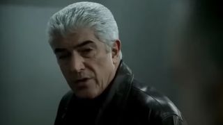 Phil Leotardo in close up, wearing a leather jacket