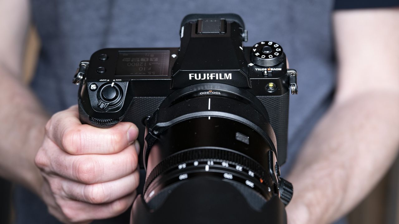 Fujifilm GFX100S II camera in the hand
