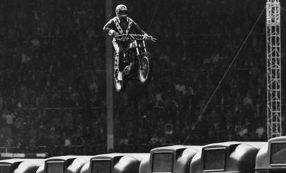 On May 27, 1975, after a night of drinking with fans in London, daredevil Evil Knievel knew he couldn't make the 13-bus jump; amid 70,000 people, he tried anyway.