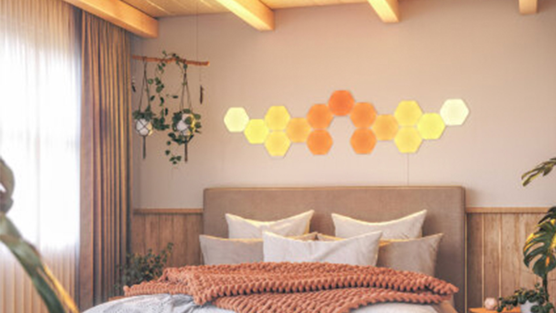 Hexagonal-shaped LED light hang above a bed