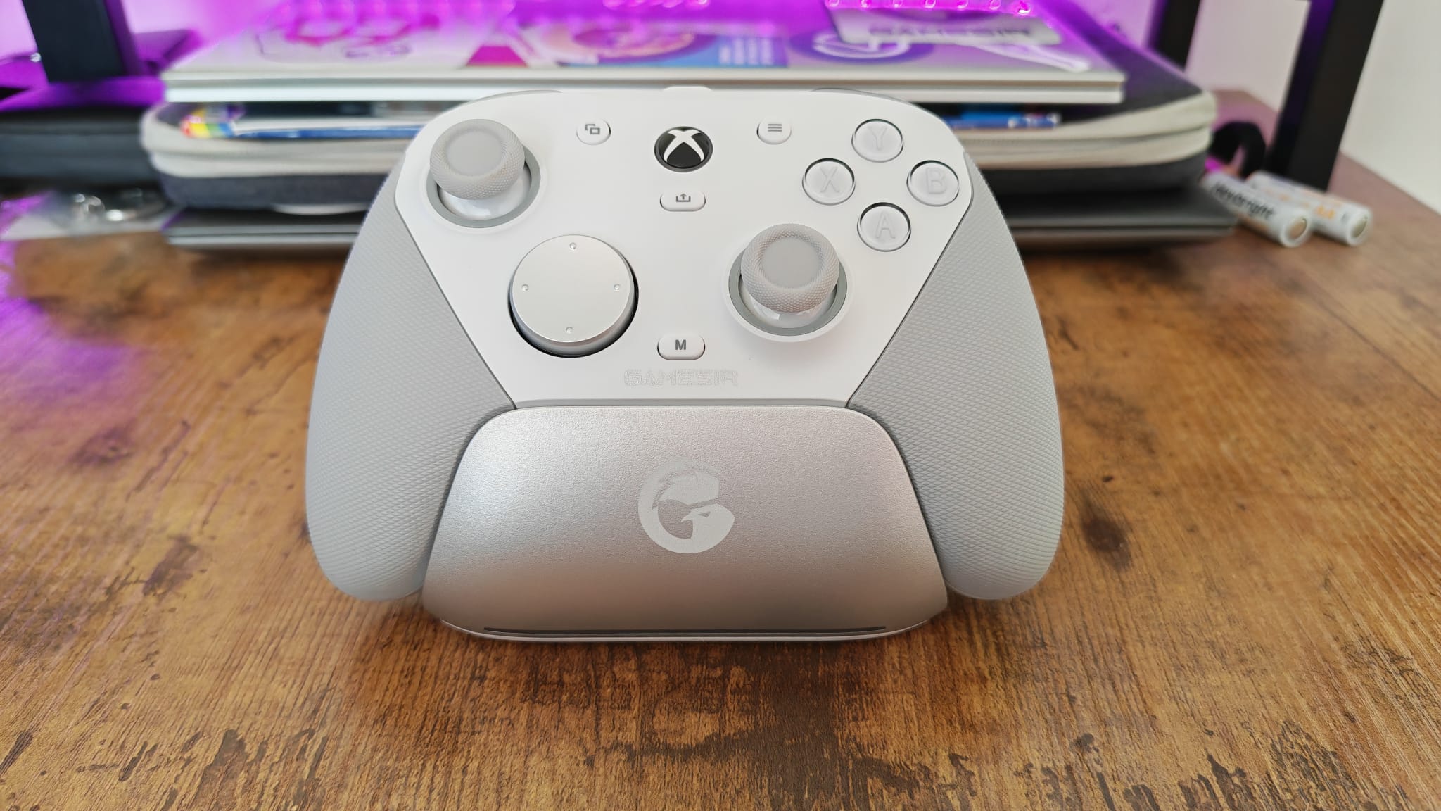 The GameSir G7 Pro on its charging stand