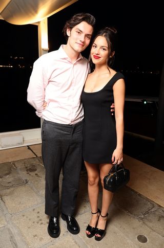 Louis Partridge (L) and Olivia Rodrigo celebrate the Venice International Film Festival World Premiere of the Apple TV+ limited series “DISCLAIMER” at Harry's Dolci on August 30, 2024 in Venice, Italy.