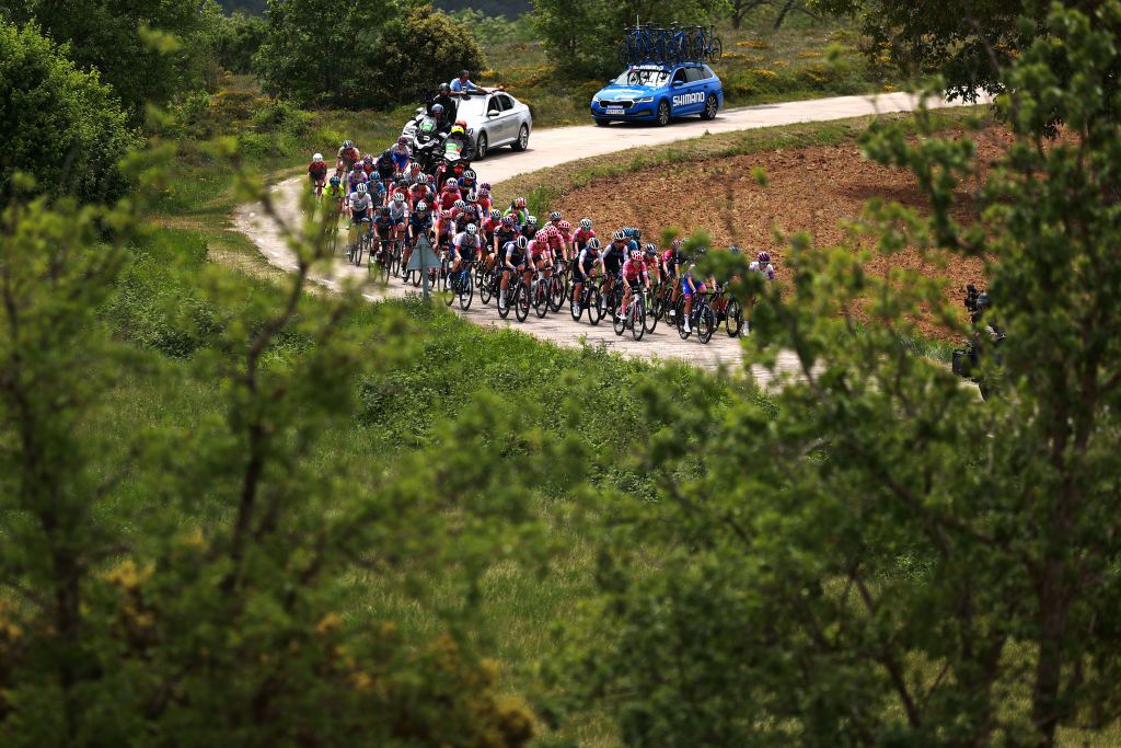 OJO GUARENA SPAIN MAY 21 A general view of the peloton passing through a landscape during the 7th Vuelta a Burgos Feminas 2022 Stage 3 a 1134km stage from Medina de Pomar to Monumento Natural de Ojo Guarea 767m VueltaBurgos BurgosFem UCIWWT on May 21 2022 in Ojo Guarea Spain Photo by Gonzalo Arroyo MorenoGetty Images