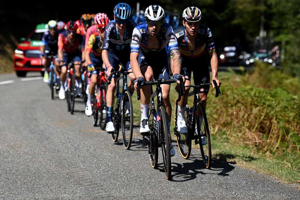 LARRABELAGUA SPAIN SEPTEMBER 09 LR Mattia Cattaneo of Italy and Remco Evenepoel of Belgium and Team Soudal Quick Step compete during the 78th Tour of Spain 2023 Stage 14 a 1562km stage from SauveterredeBarn to LarraBelagua 1588m UCIWT on September 09 2023 in LarraBelagua Spain Photo by Tim de WaeleGetty Images