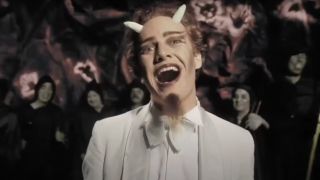 Danny Elfman sings with a smile dressed as Satan in Forbidden Zone.