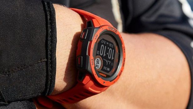 Person wearing Garmin Instinct Solar watch