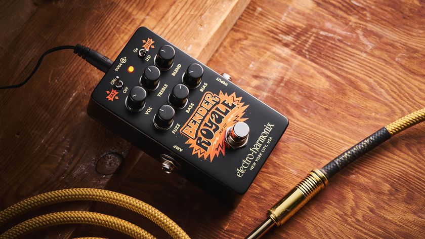 Electro-Harmonix Bender Royale &ndash; the feature-packed fuzz pedal is finished in a black enclosure with orange graphics/text, and is photographed here in warm tones against a wooden background.