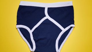 Blue Retro Y-fronts against a solid yellow background