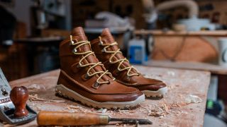 Vivbarefoot Tracker Moc in brown leather on a workbench