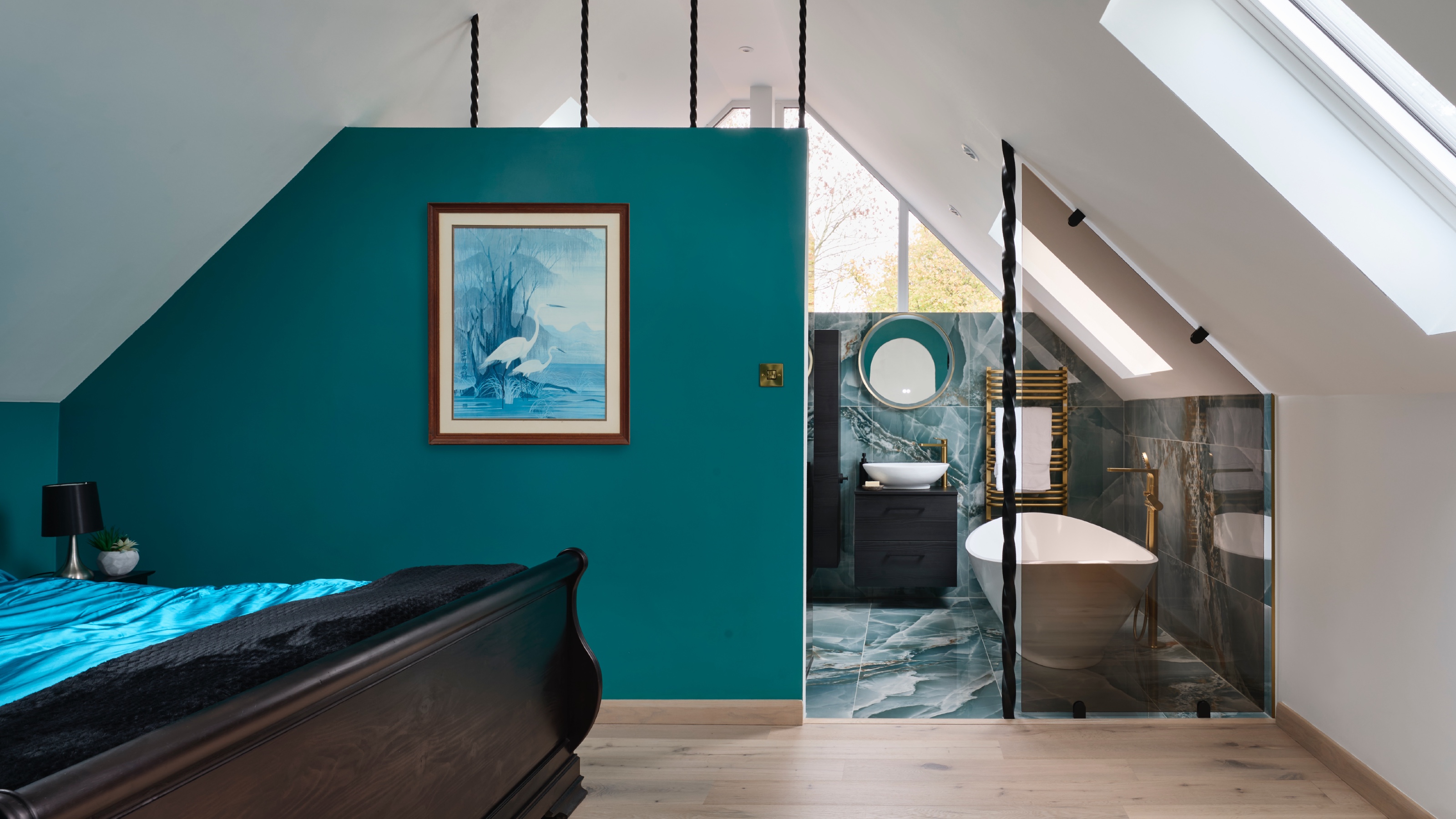 teal bedroom with ensuite bathroom 