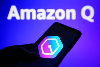 Amazon Q logo displayed on a smartphone with Amazon branding in background 