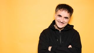 The Supervet's Noel Fitzpatrick against a yellow background