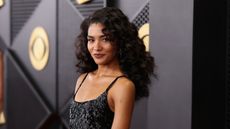 olivia dean on a black background