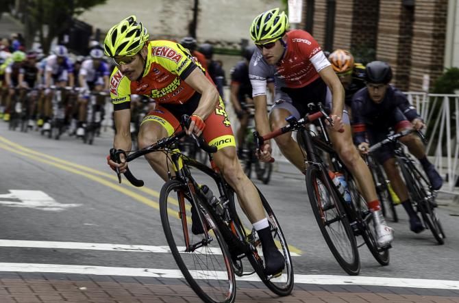 Astellas Cycling rider Brecht Dhaene sits second wheel early in the race.
