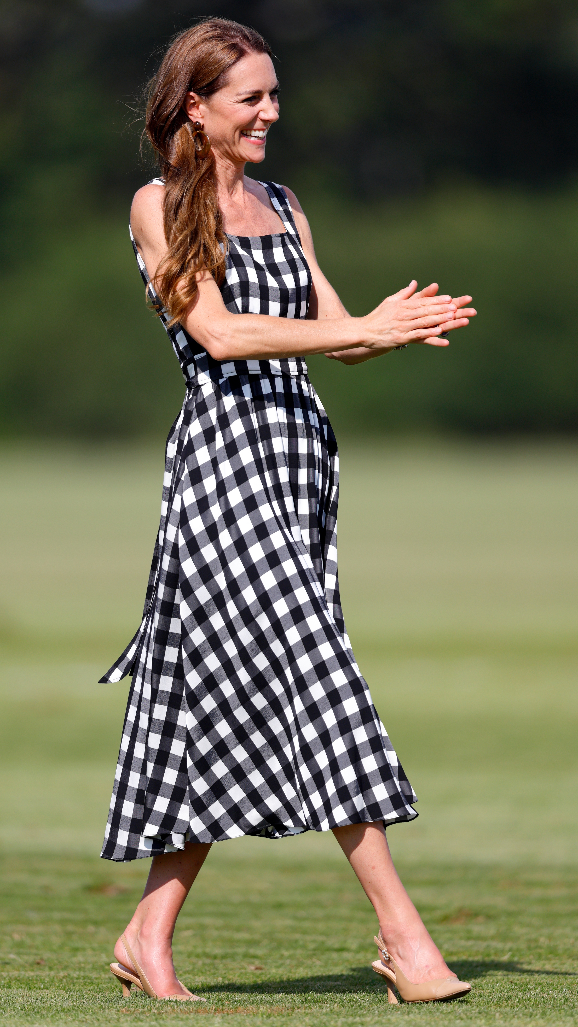 Catherine, Princess of Wales claps as she attends the DMMI Royal Charity Polo Cup 2026
