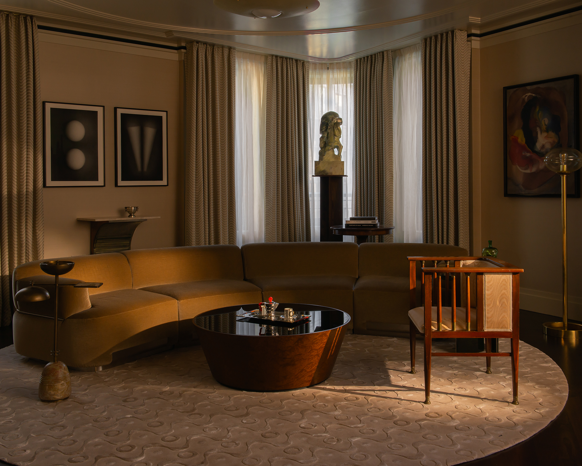 living room with large circular rug in the middle of it