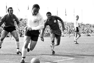 George Cohen in action for Fulham against Leeds United in 1966