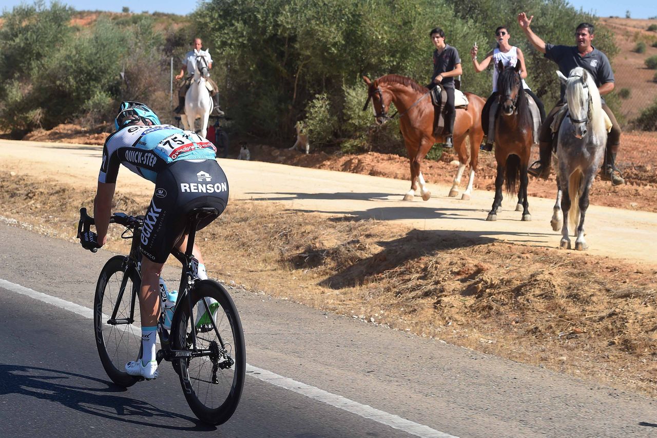 Keisse passes some roadside fans
