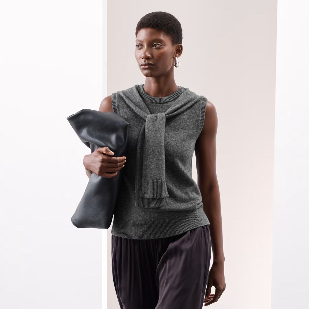 model wearing grey m&amp;s knitted top