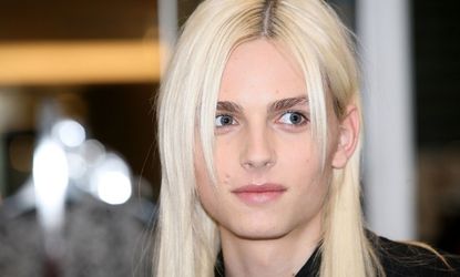 Androgynous male model Andrej Pejic may be a hot item in the fashion world, but book retailers want his bare-chested magazine cover to be covered up.