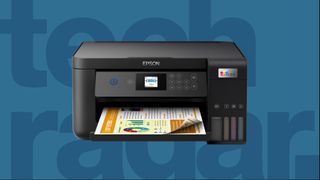 beste fotoprinter: en Epson printer mot blå bakgrunn