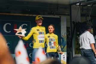 Joe Blackmore and Marion Bunel on the podium of the Tour de l'Avenir