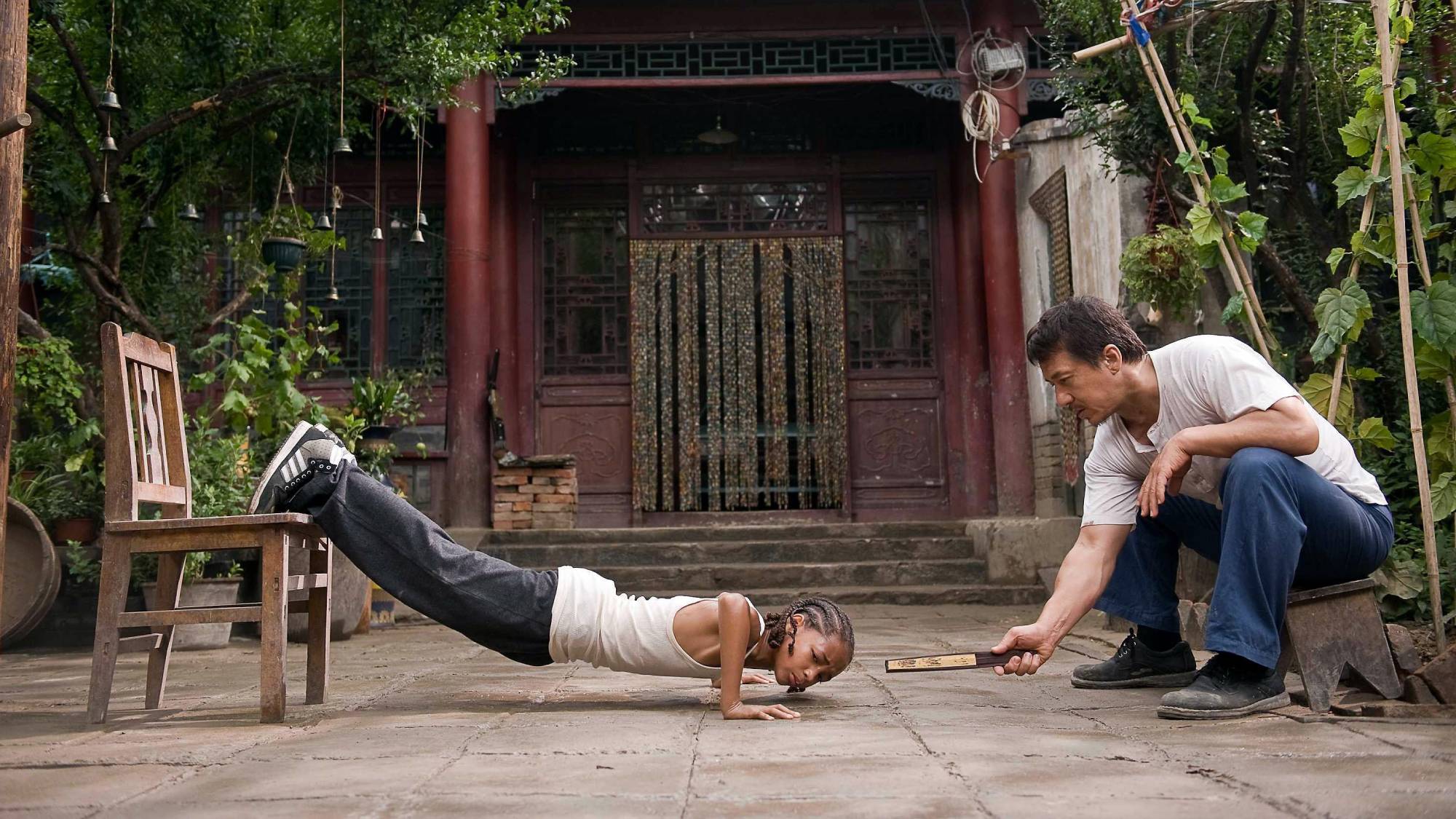 (L-R) Jaden Smith as Dre Parker and Jackie Chan as Mr. Han in "The Karate Kid" (2010)