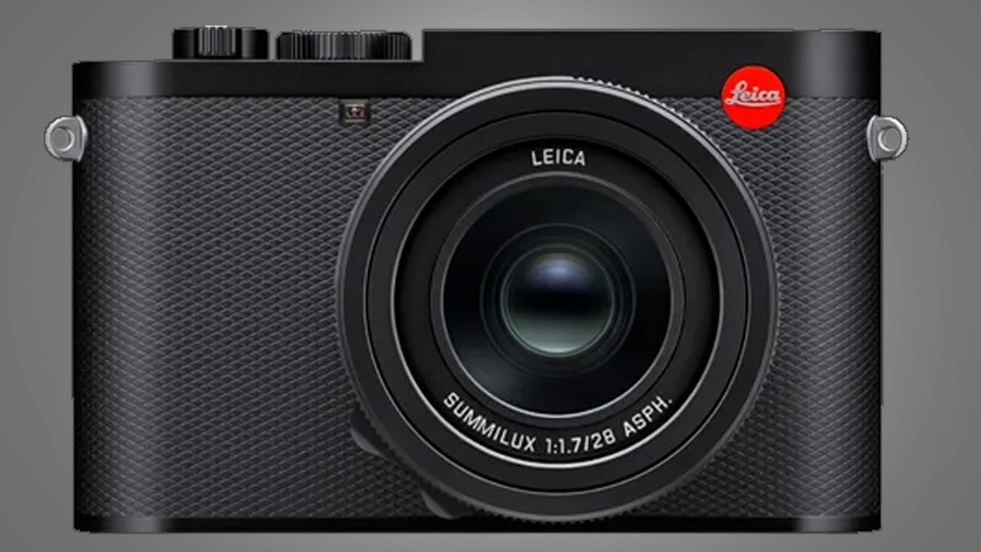 A leaked image of the front of the Leica Q3 camera on a grey background