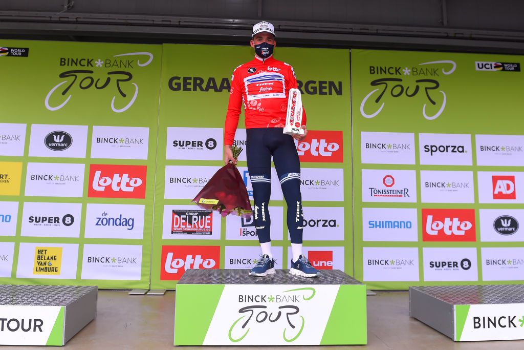 GERAARDSBERGEN BELGIUM OCTOBER 03 Podium Mads Pedersen of Denmark and Team Trek Segafredo Red Points Jersey Celebration Trophy Flowers Mask Covid safety measures during the 16th BinckBank Tour 2020 Stage 5 a 1836km stage from Ottignies Louvain la Neuve to Muur van Geraardsbergen 108m BinckBankTour BinckBankTour on October 03 2020 in Geraardsbergen Belgium Photo by Luc ClaessenGetty Images