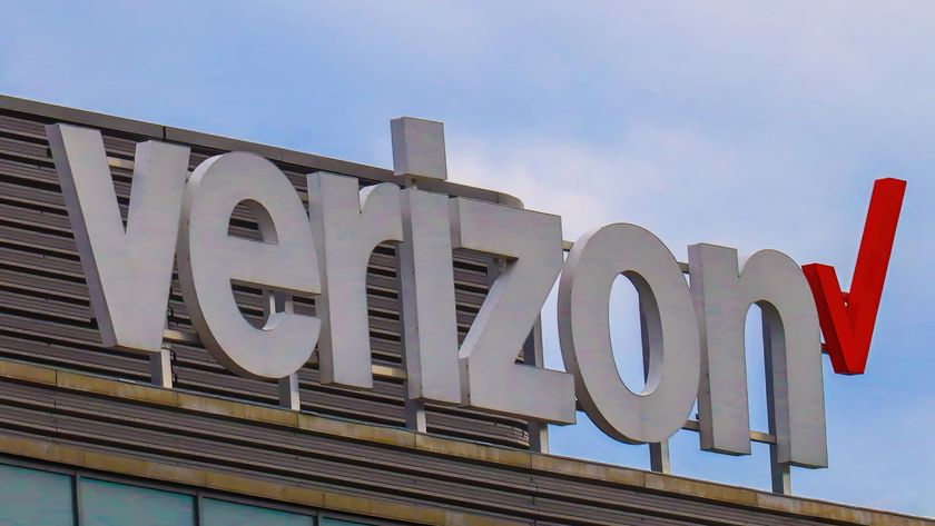 Verizon logo on a building with blue sky above