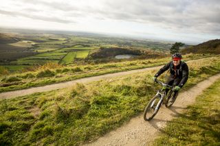 MTB rider above scenic Yorkshire view