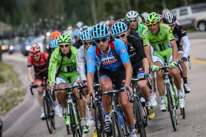 Garmin comes to the front over the climb.