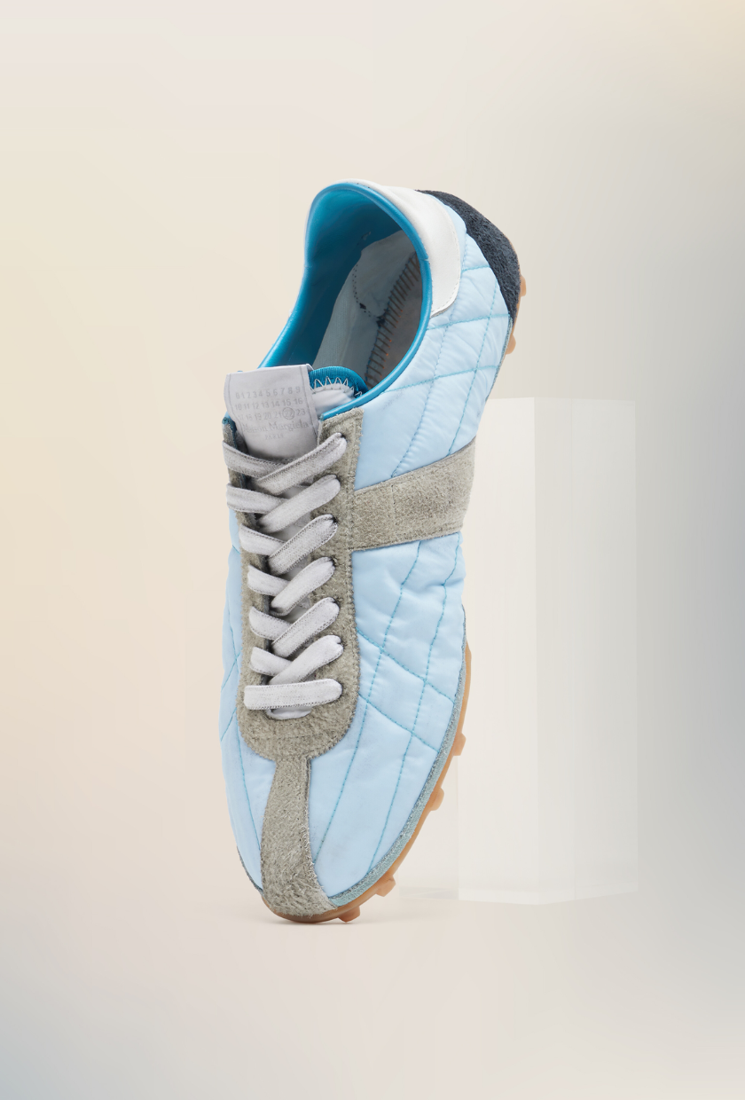 An image of Maison Margiela sprinter trainers.