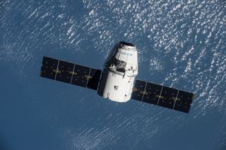 This view of a SpaceX Dragon cargo ship as seen from the International Space Station is a NASA file photo from a July 2016 mission. On Feb. 22, 2017, a Dragon capsule aborted its approach to the station due a navigation software issue.