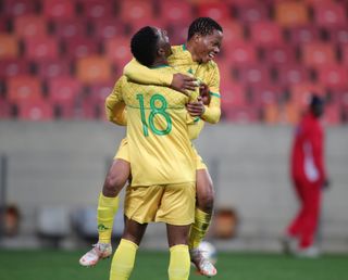 Kagiso Malinga celebrates his goal with Sphelele Mkhulise