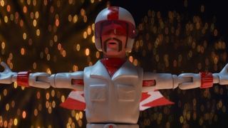 Duke Caboom jumps a far distance with arms wide out in Toy Story 4