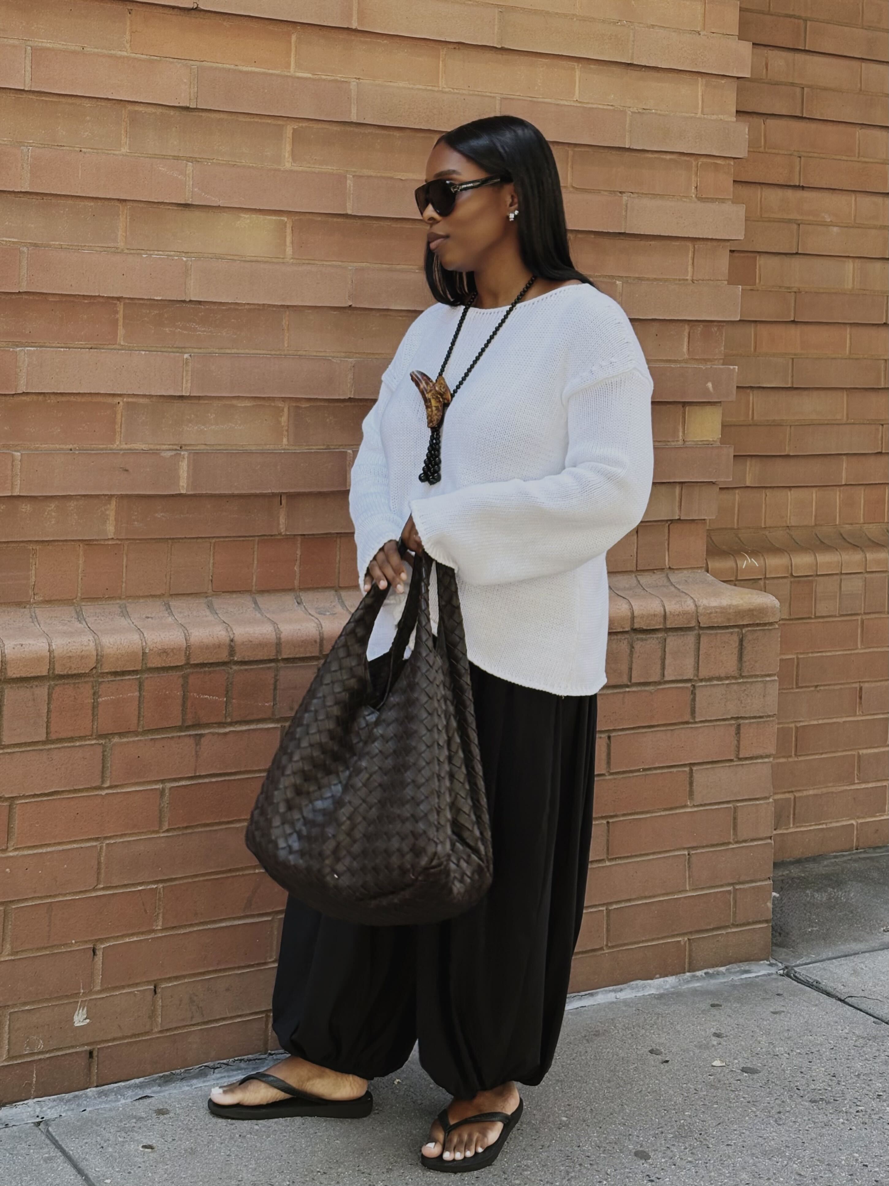 black woman wearing neutral fall outfits