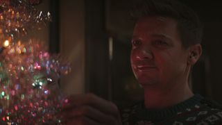 Clint Barton decorating a Christmas tree in Hawkeye episode 4