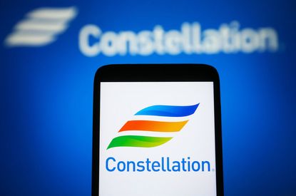 constellation energy logo on smartphone with blurred logo in background