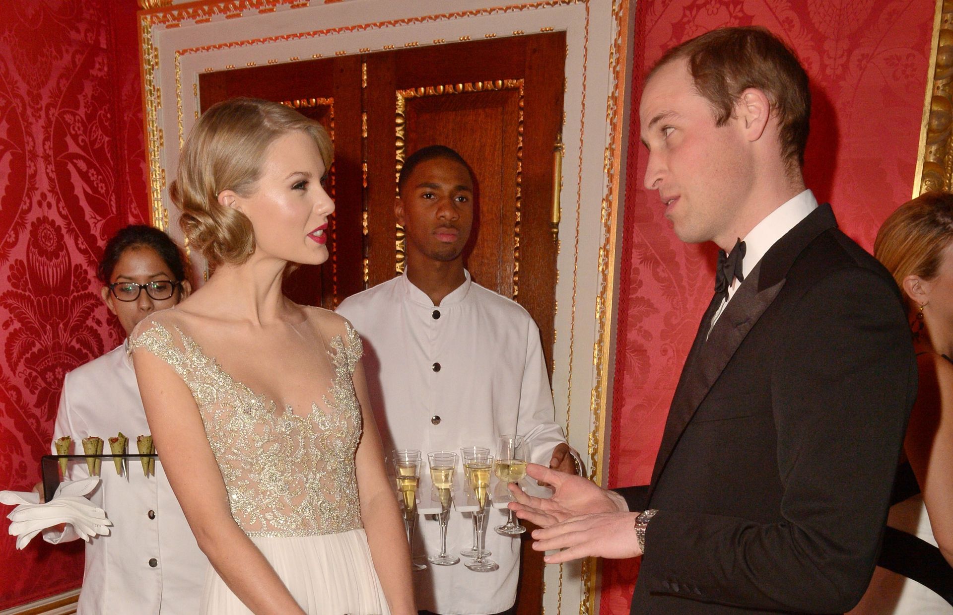 Prince William, Duke of Cambridge and Taylor Swift attend the Winter Whites Gala In Aid Of Centrepoint on November 26, 2013 in London, England.