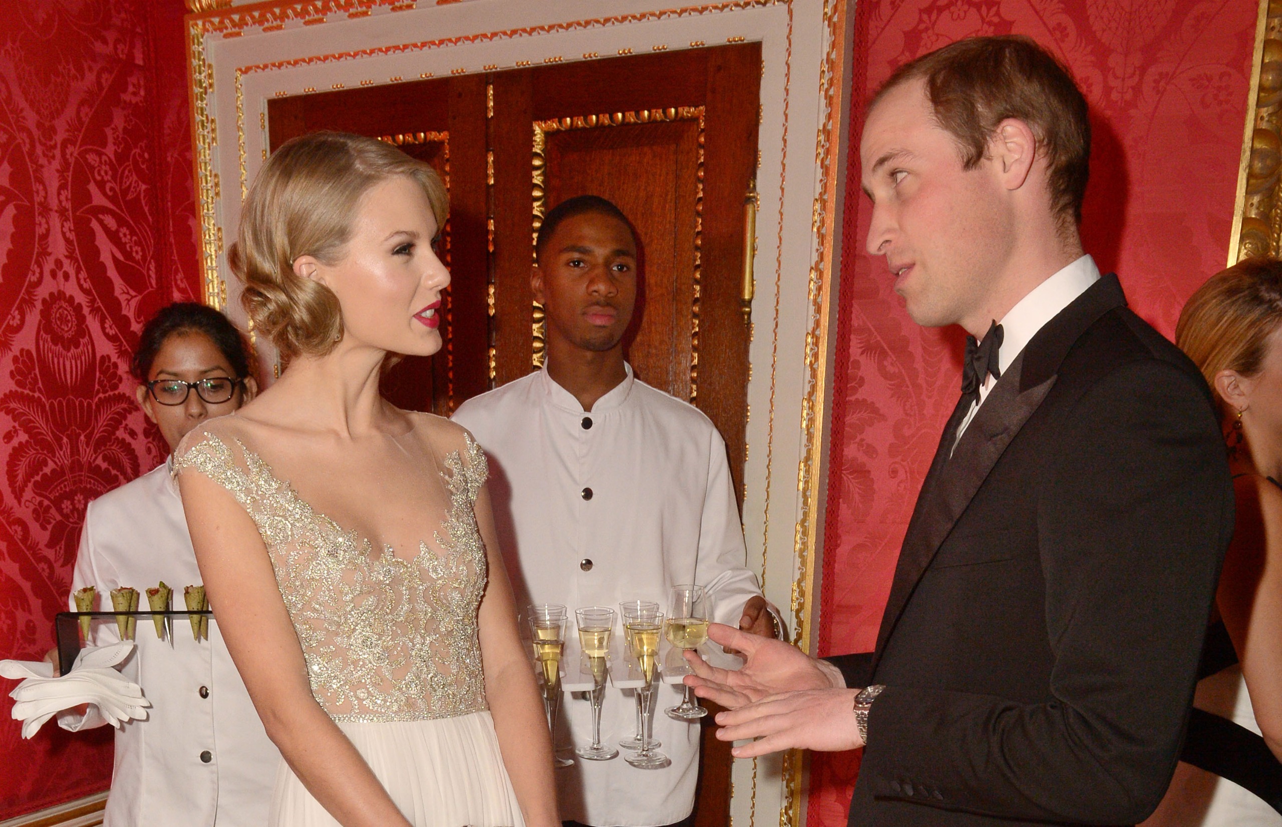 Prince William, Duke of Cambridge and Taylor Swift attend the Winter Whites Gala In Aid Of Centrepoint on November 26, 2013 in London, England.