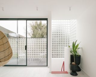 Remi Connoly-Taylor's new home features glass bricks and an upstairs terrace