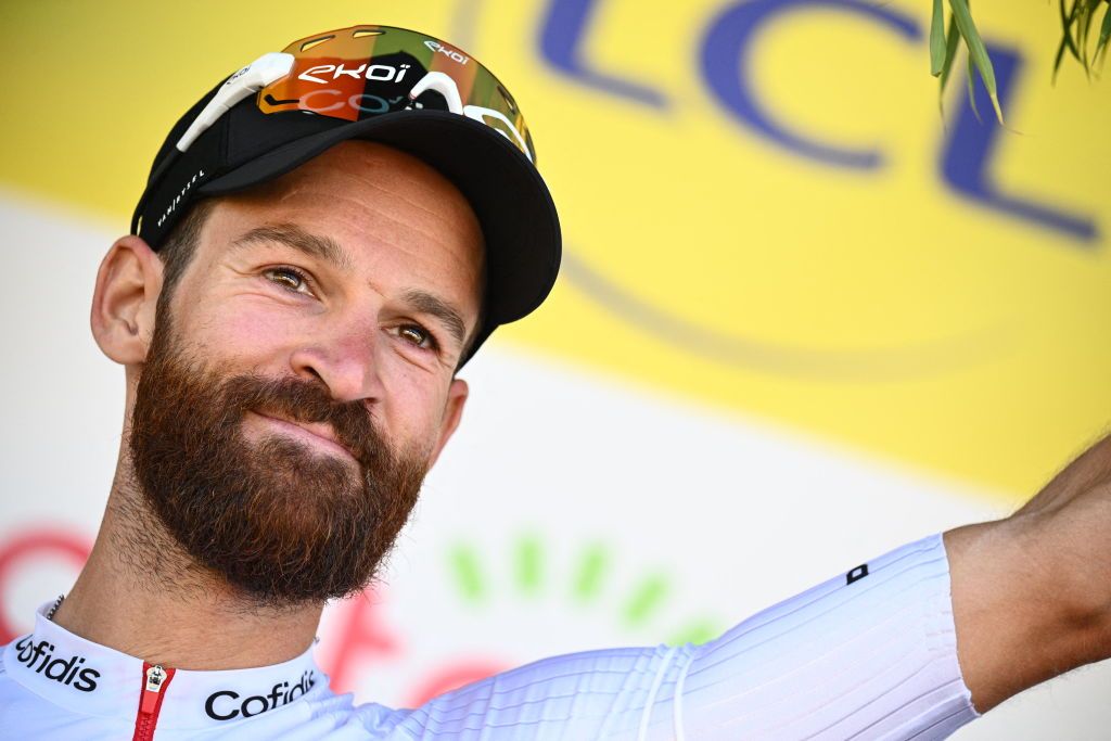 German Simon Geschke of Cofidis celebrates on the podium of stage seven of the Tour de France cycling race a 176 km race from Tomblaine to La Super Planche des Belles Filles France on Friday 08 July 2022 This years Tour de France takes place from 01 to 24 July 2022 BELGA PHOTO POOL JASPER JACOBS UK OUT Photo by JASPER JACOBS BELGA MAG Belga via AFP Photo by JASPER JACOBSBELGA MAGAFP via Getty Images
