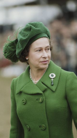 The late Queen wearing a traditional tam o'shanter hat