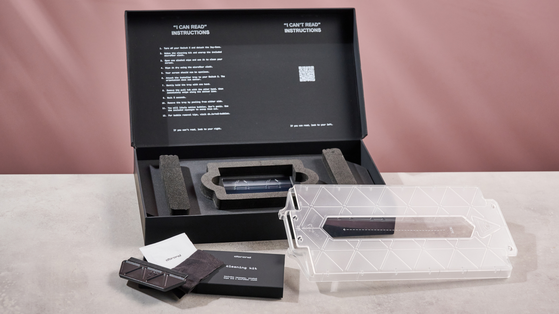 DBrand Prism 2.0 for Nintendo Switch 2 with box and cleaning products