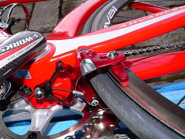 The rear brake is located behind the bottom bracket shell in a sheltered area for minimal impact on aerodynamics.